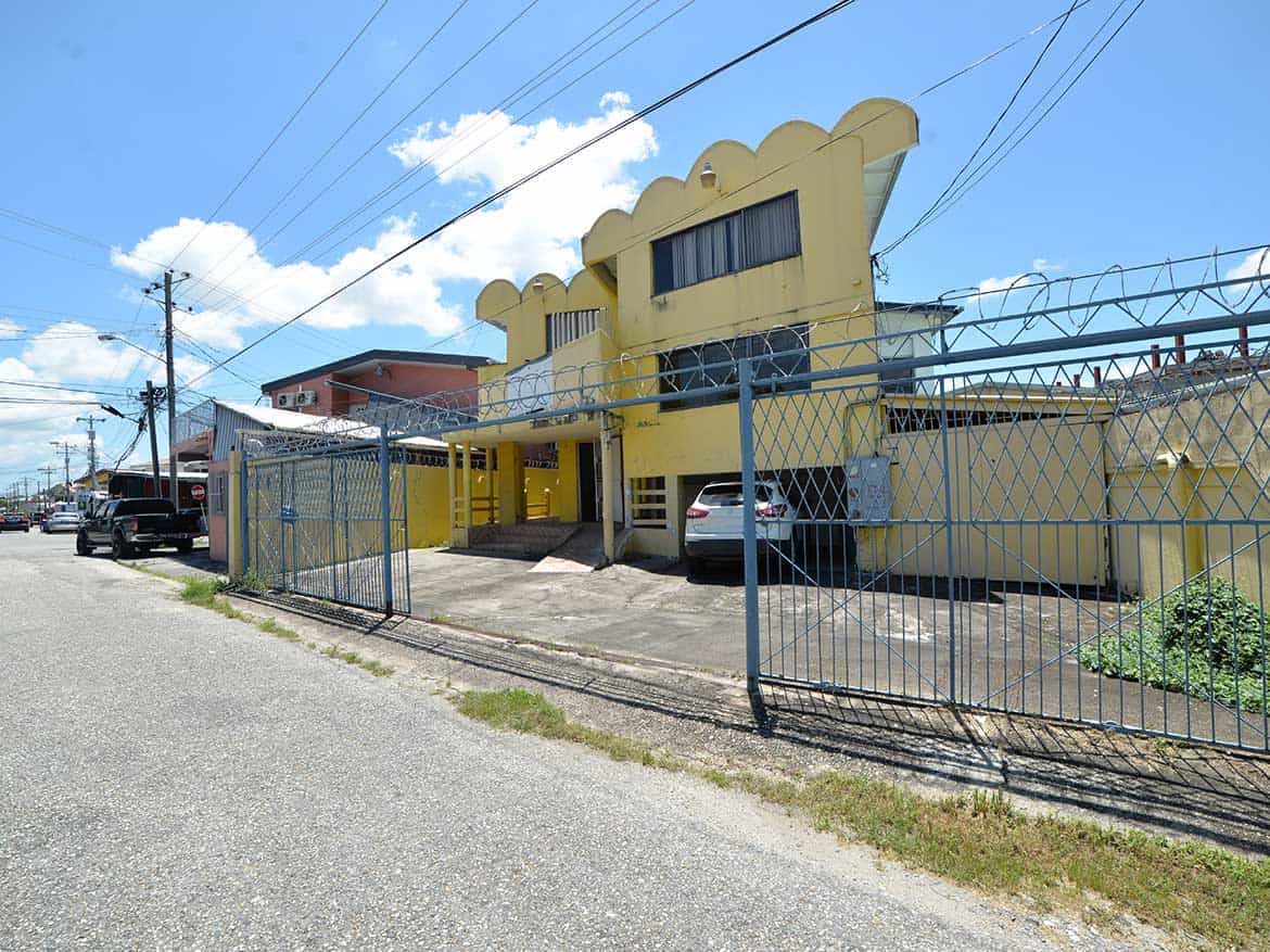 Cornerstone™ Commercial Building in Curepe Cornerstone- Commercial building on Sellier Street, Curepe with parking and security gate.