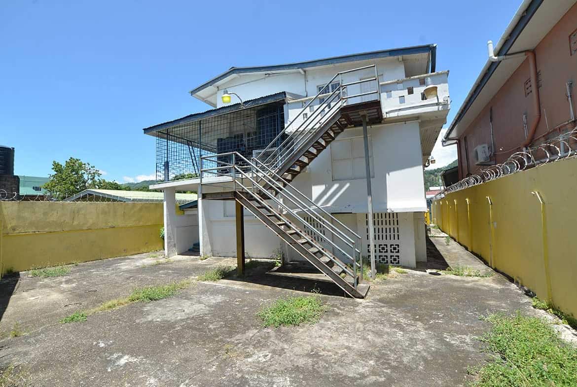 Cornerstone- Modern commercial building with external staircase in Curepe, Trinidad and Tobago.