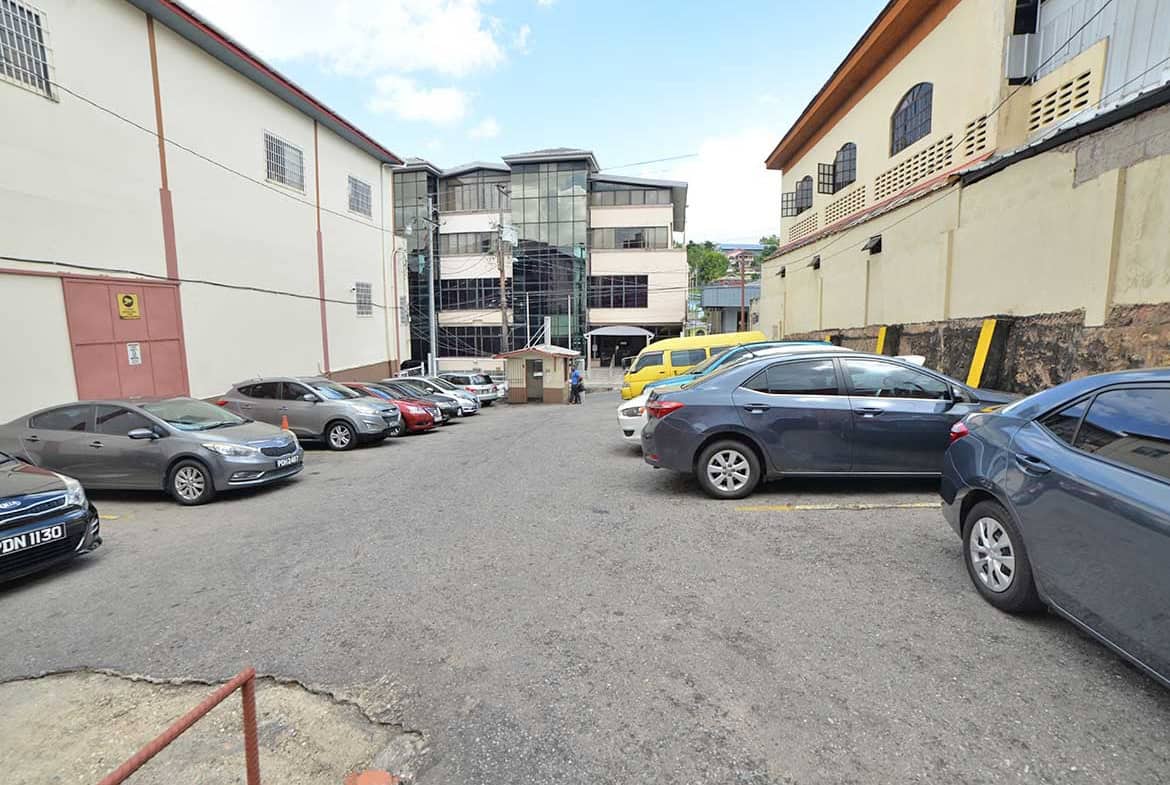 Cornerstone- Parking lot with cars in St James Street near Cornerstone™ building.
