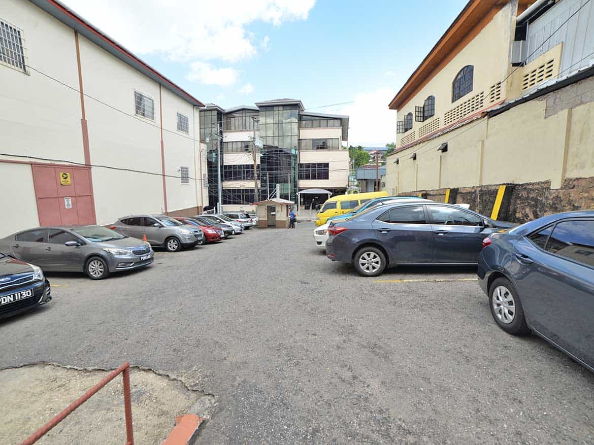 Cornerstone™ Parking Area in St James Street Cornerstone- Parking lot with cars in St James Street near Cornerstone™ building.