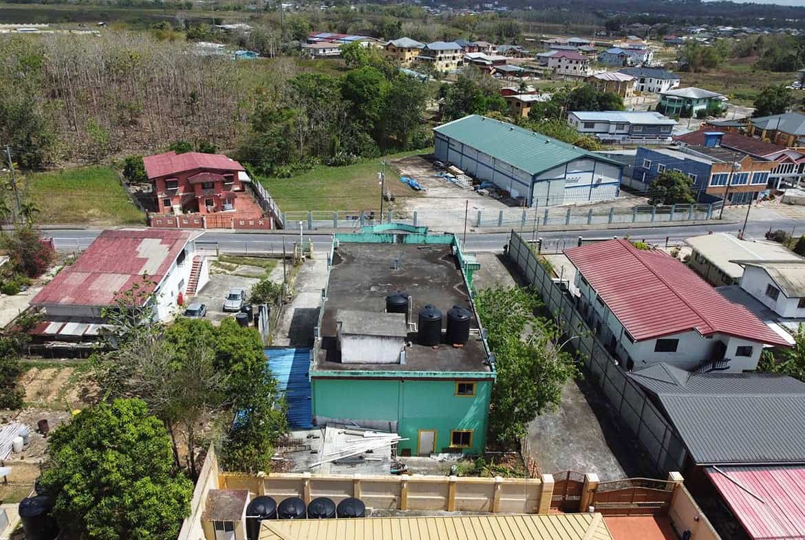 Cornerstone- Aerial view of Cornerstone™ property with buildings and greenery.
