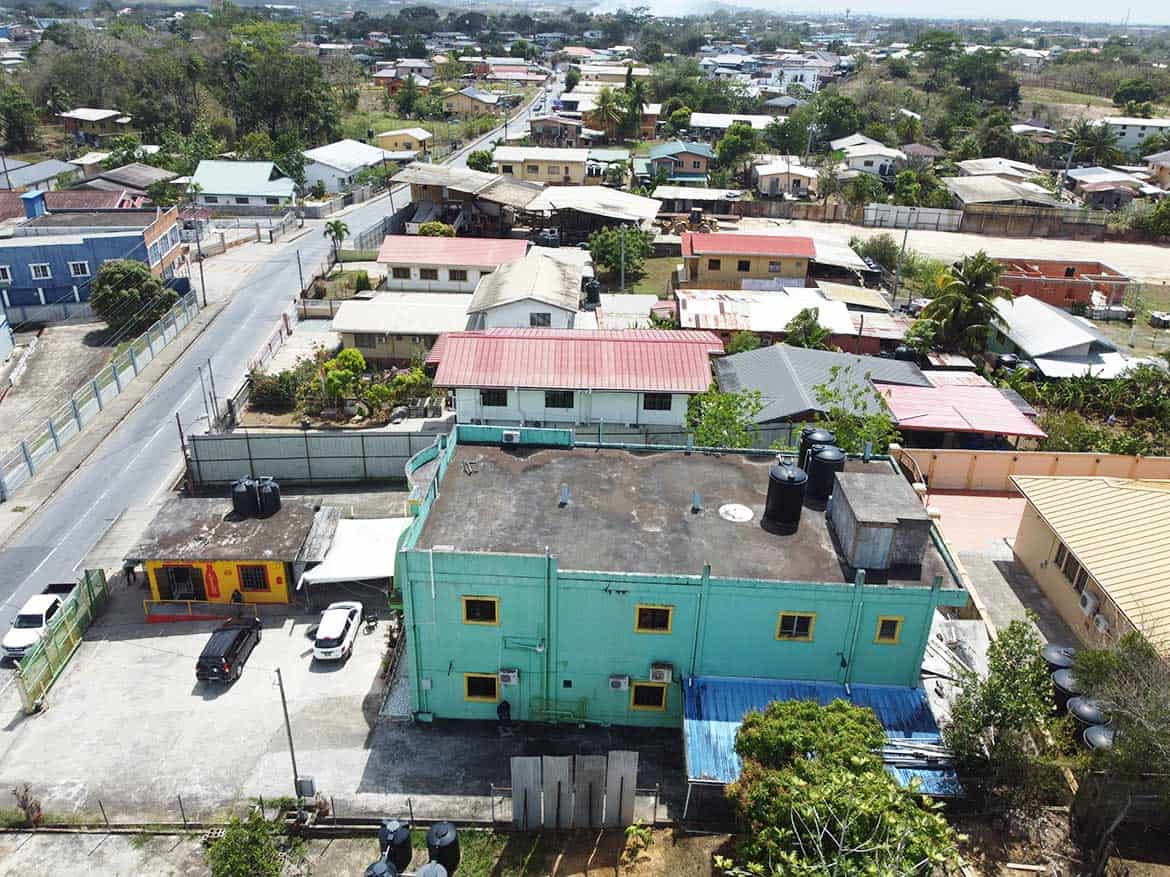 Cornerstone™ Residential Area in Bonne Aventure Cornerstone- Aerial view of a colorful residential neighborhood in Bonne Aventure, Trinidad.