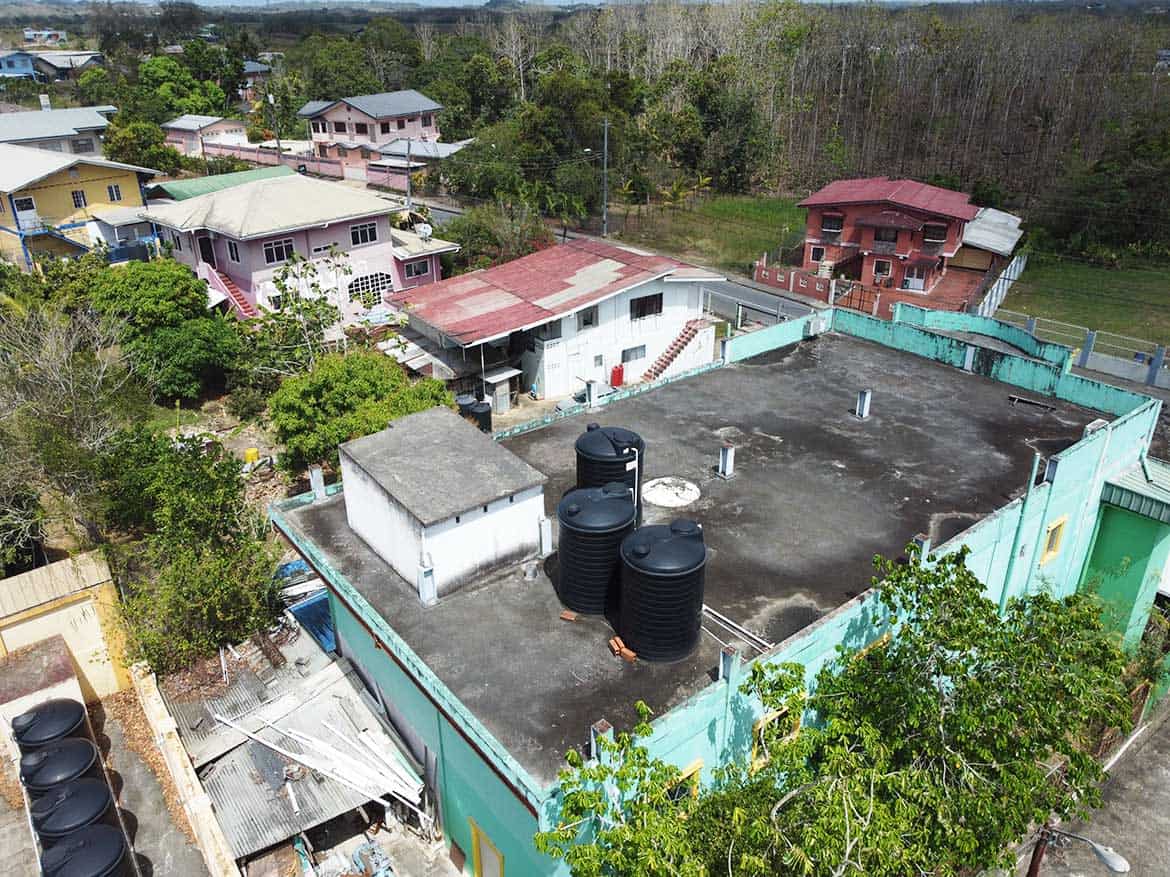Cornerstone™ Building on Bonne Aventure Road Cornerstone- Aerial view of Cornerstone™ building with water tanks on Bonne Aventure Road.