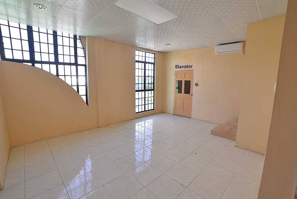 Cornerstone- Spacious office area with large windows and elevator access.