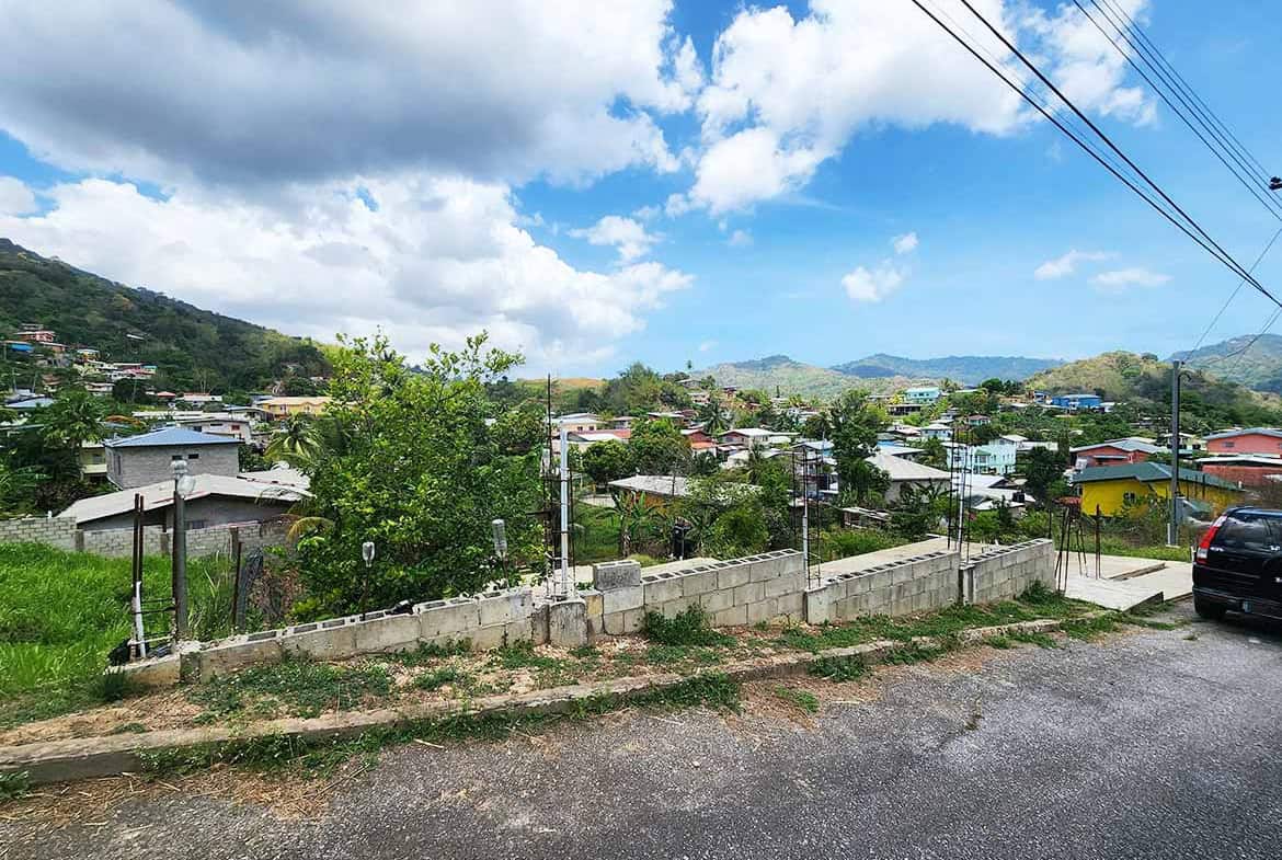 Cornerstone- View of residential area in Graceland Heights with hills and sky.