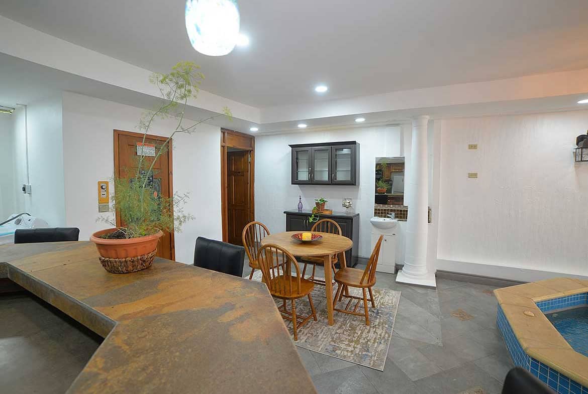 Cornerstone- Interior view of a 1-bedroom apartment with dining area and modern decor.