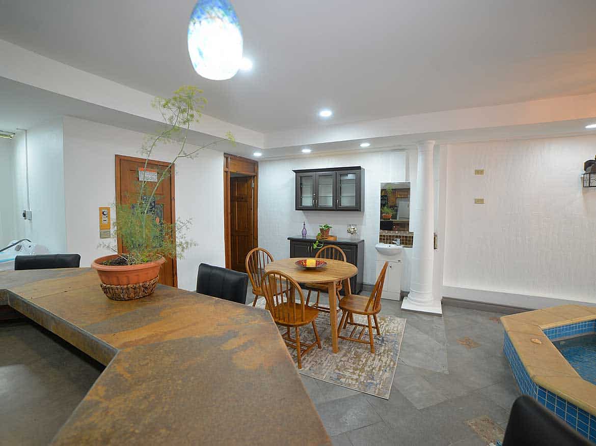 Cozy 1-Bedroom Apartment Interior Cornerstone- Interior view of a 1-bedroom apartment with dining area and modern decor.