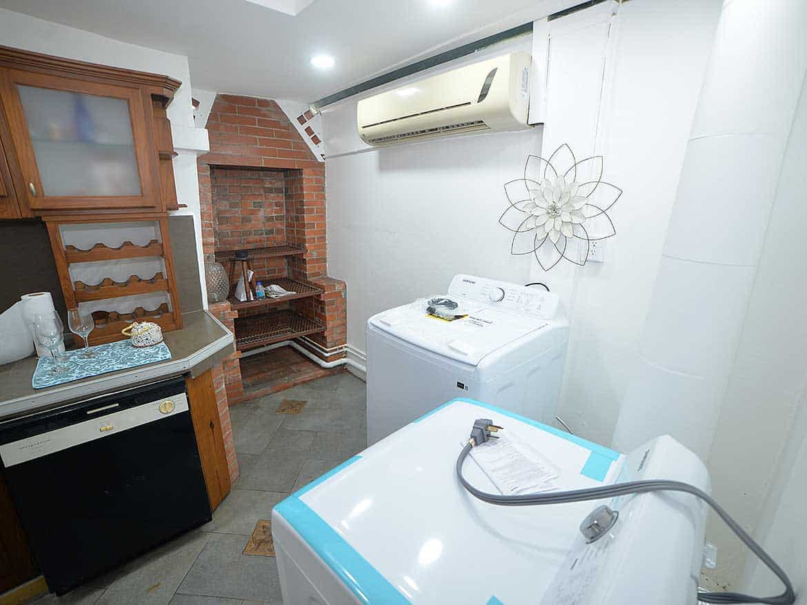 Laundry Area in 1-Bedroom Apartment Cornerstone- Compact laundry space with washing machine and dryer in Cornerstone™ apartment.
