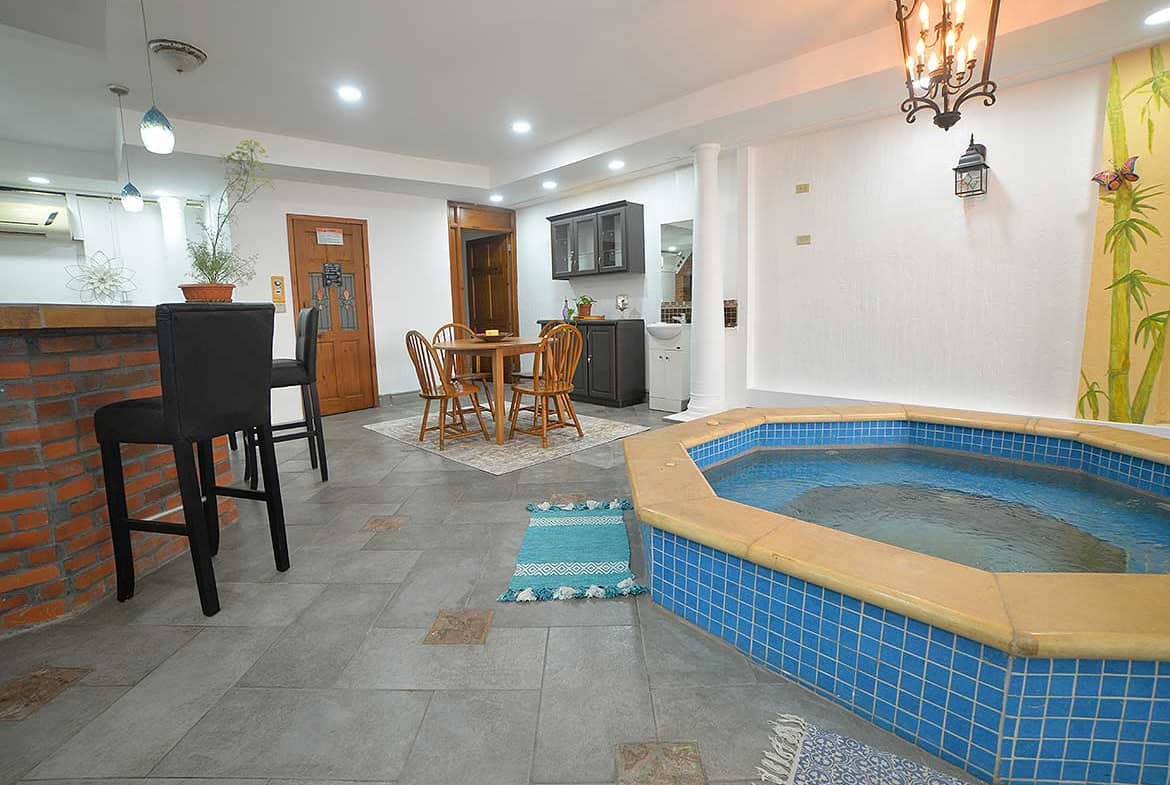 Cornerstone- Indoor pool with seating and decor at Cornerstone.