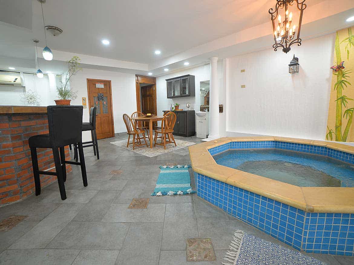 Indoor Pool Area at Cornerstone Cornerstone- Indoor pool with seating and decor at Cornerstone.