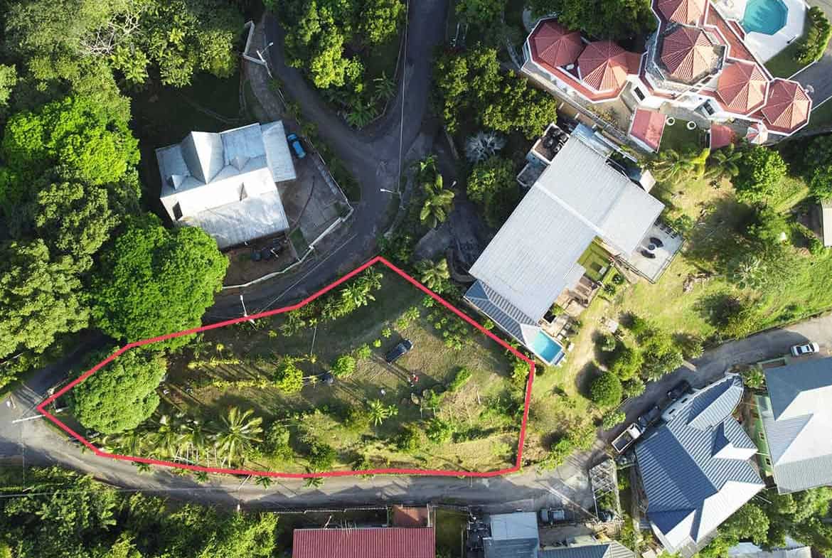 Cornerstone- Aerial view of hilltop land in St Augustine with surrounding homes and greenery.