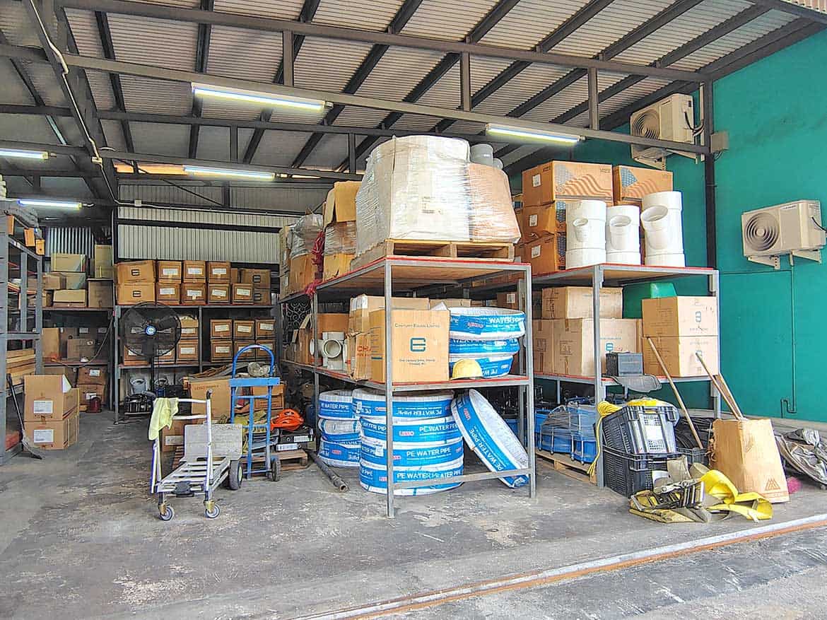 Storage Area at Cornerstone™ Cornerstone- Warehouse storage with boxes, pallets, and equipment at Cornerstone™.