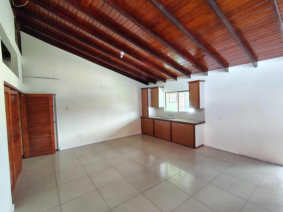 Spacious Living Area at Ganga Terrace Cornerstone- Bright, open living space with wooden ceiling and tiled floor at Ganga Terrace.
