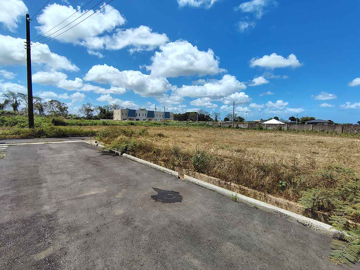 Cornerstone- Vacant land plot with clear sky near St Louis Dr, Longdenville.