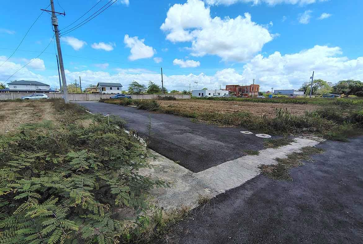 Cornerstone- Vacant land on St Louis Dr, Longdenville with clear skies.