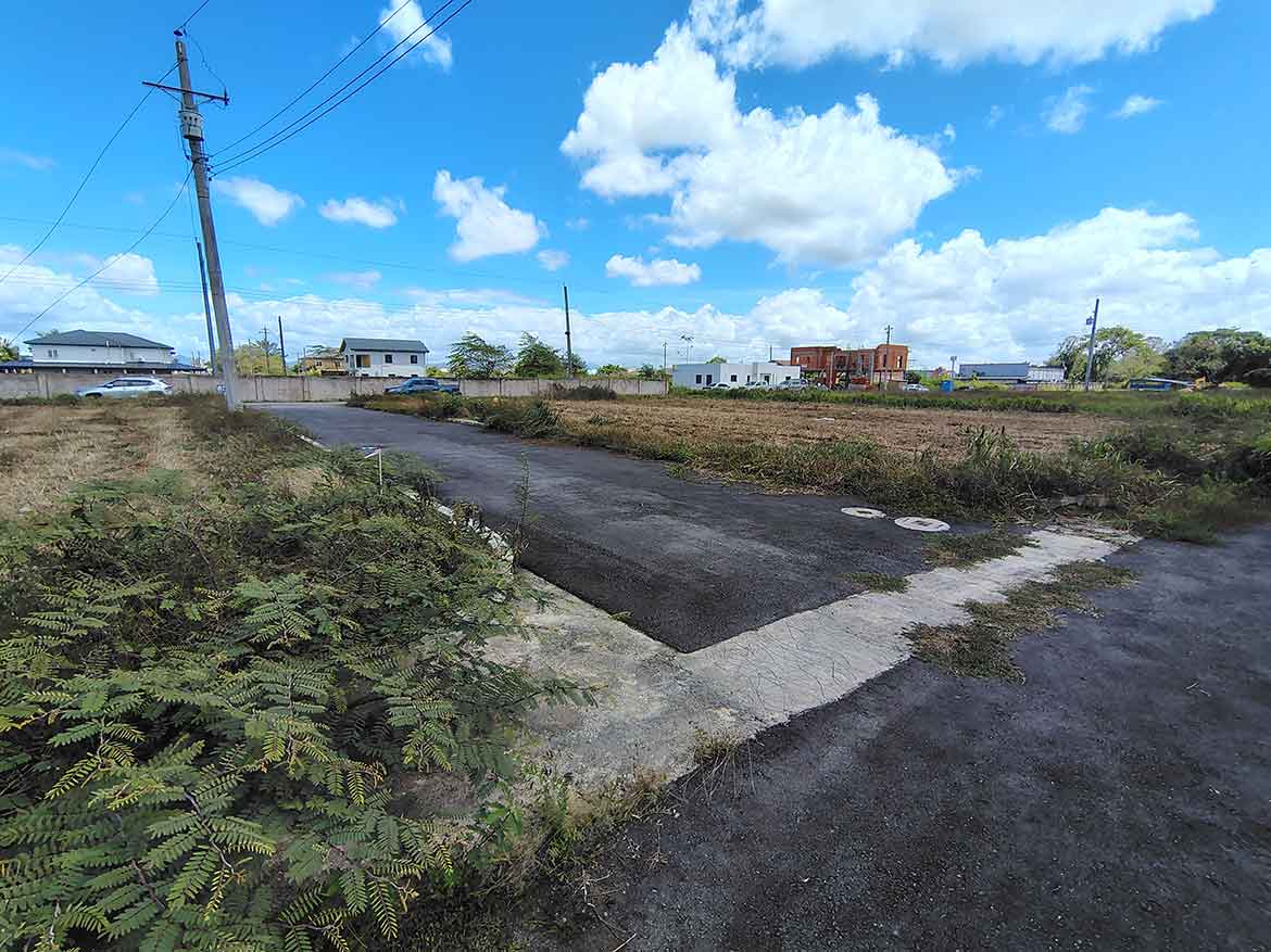 Cornerstone- Vacant land on St Louis Dr, Longdenville with clear skies.