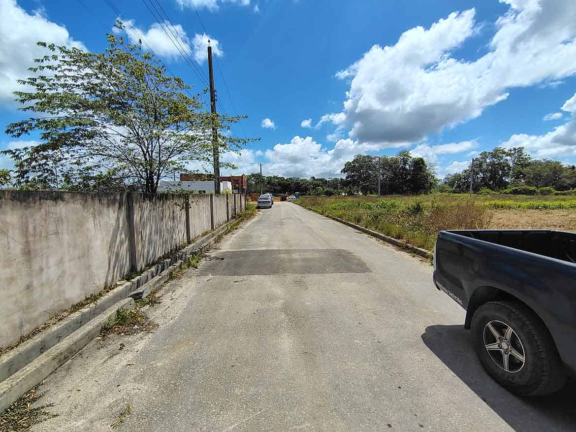 Cornerstone- Quiet street scene on St Louis Dr, Longdenville with blue sky and clouds.