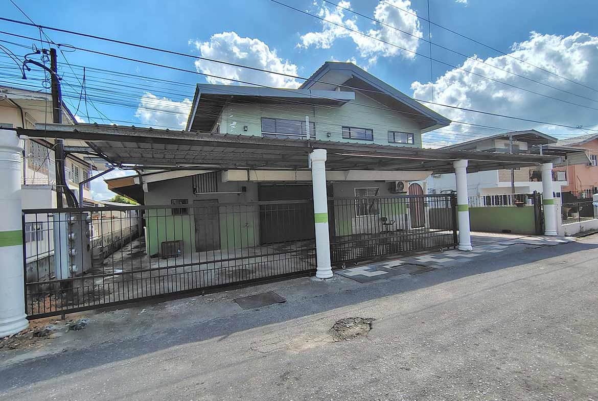 Cornerstone- Residential house with carport and white pillars in El Socorro.