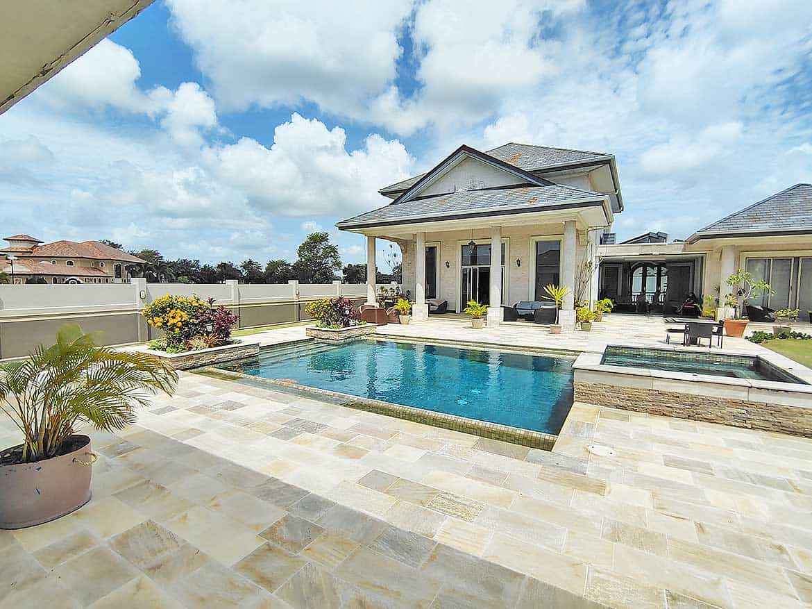 Luxury Home with Pool at Millennium Lakes Cornerstone- Elegant backyard with swimming pool and patio at Millennium Lakes Home.