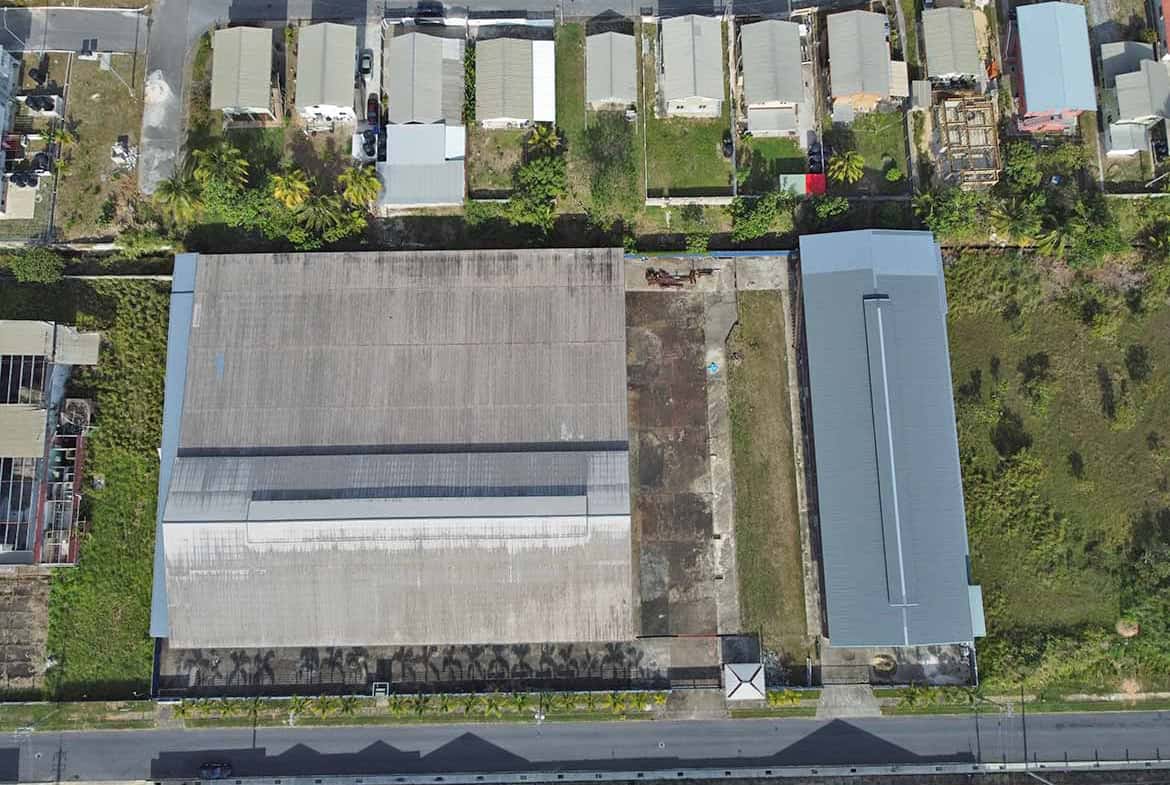 Cornerstone- Aerial view of e TecK Building in O'meara with surrounding residential area.