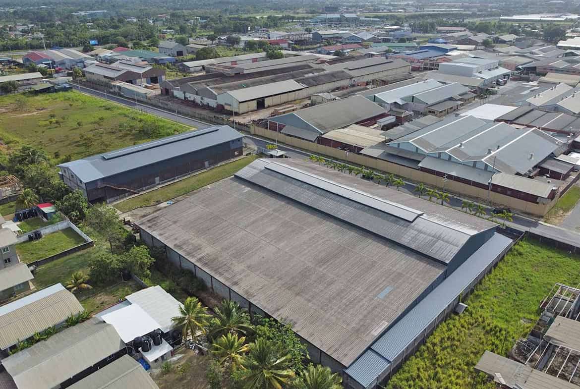 Cornerstone- Aerial view of industrial warehouse complex in O'meara, Trinidad and Tobago.