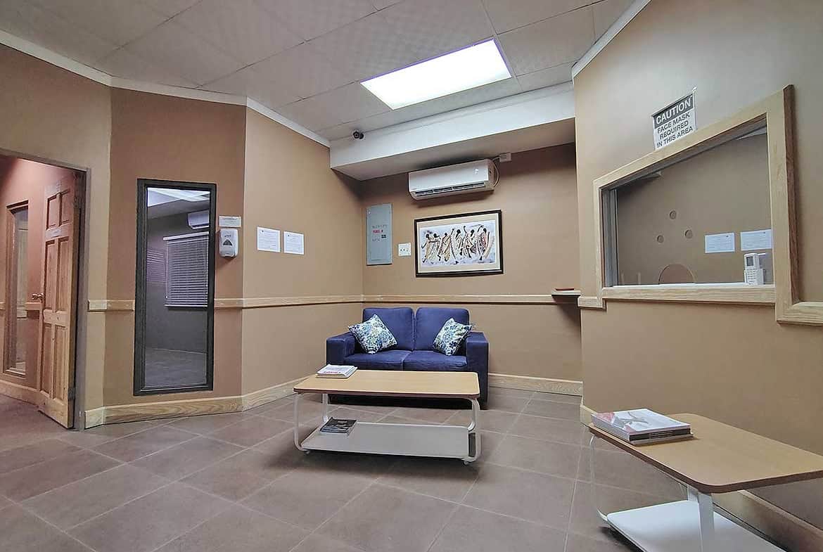 Cornerstone- Interior view of e TecK Building in O'meara with seating area and reception window.