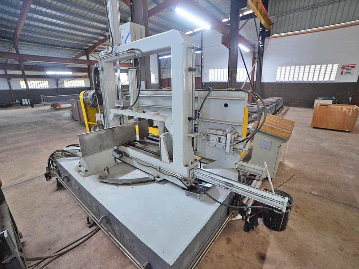 Industrial Cutting Machine at Cornerstone Cornerstone- Industrial cutting machine in a factory setting at Cornerstone.