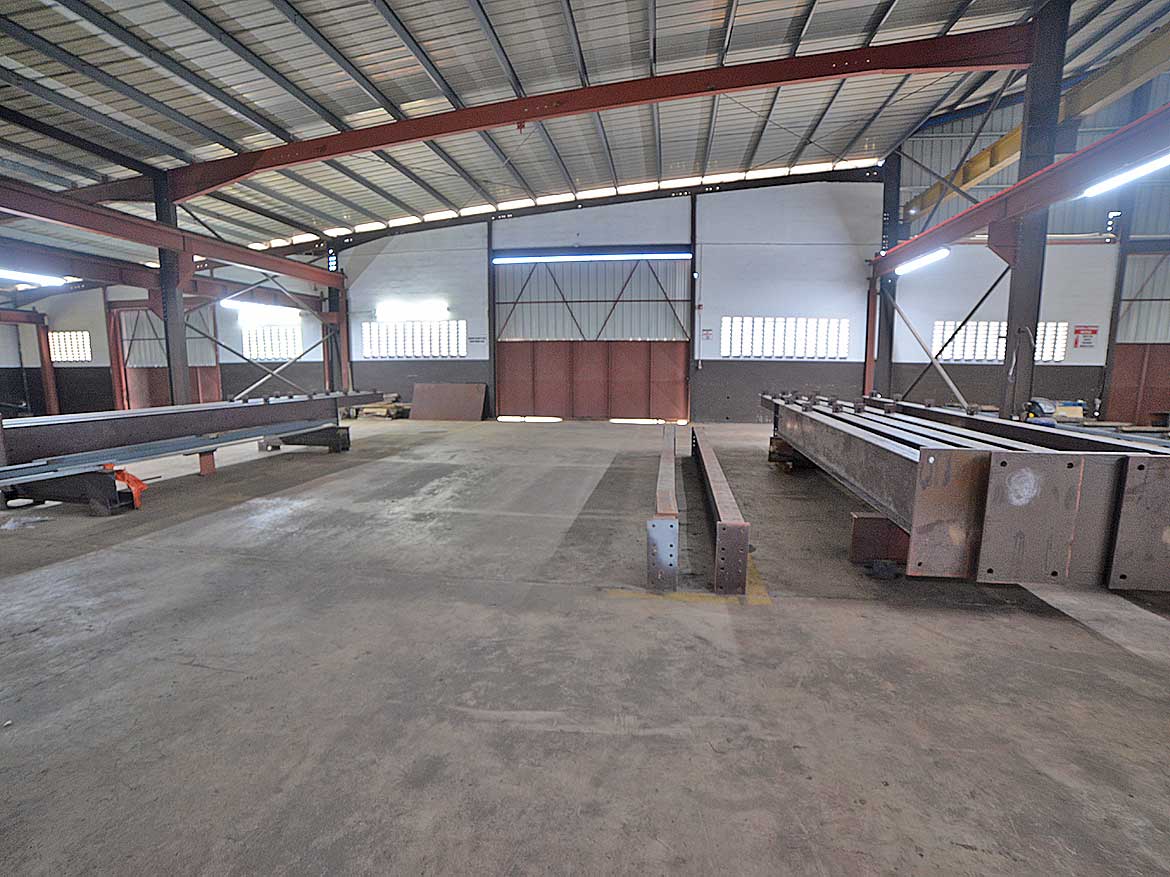 Industrial Warehouse at e TecK Building Cornerstone- Spacious industrial warehouse with steel beams and concrete floor at e TecK Building.