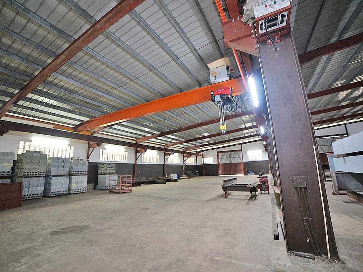 Industrial Crane at e TecK Building Cornerstone- Large industrial crane inside e TecK Building in O'meara for manufacturing.