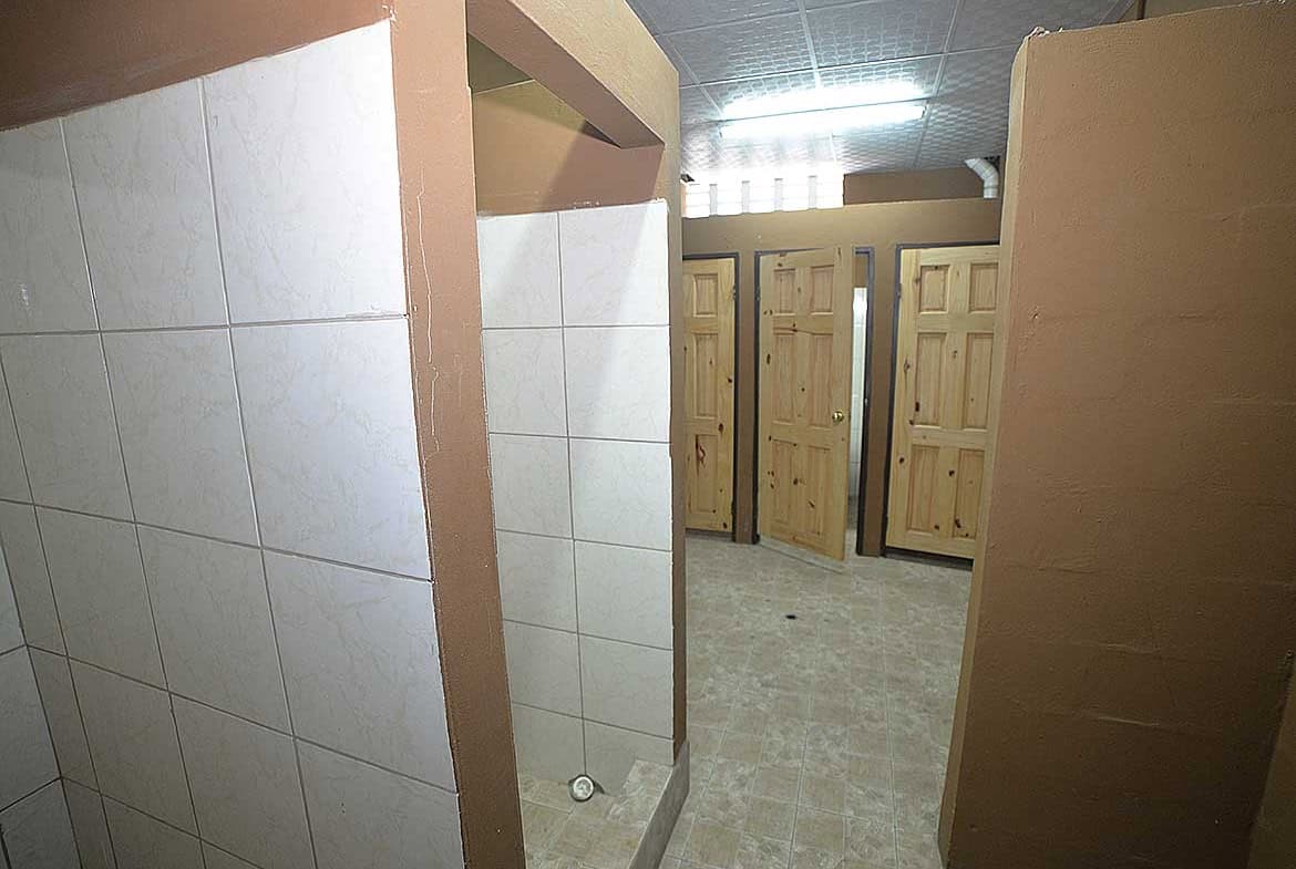 Cornerstone- Restroom stalls at e TecK Building O'meara by Cornerstone™.