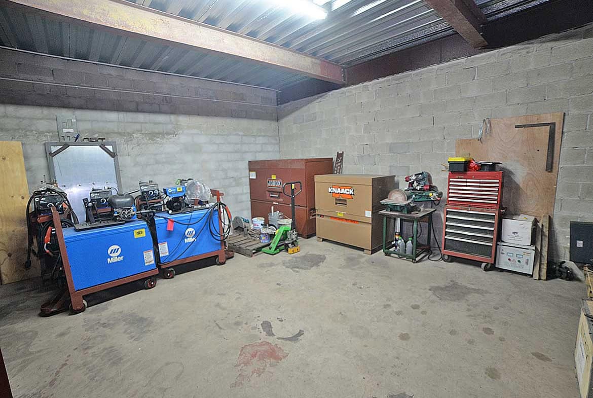 Cornerstone- Industrial workshop storage with tools, equipment, and machinery in O'meara.