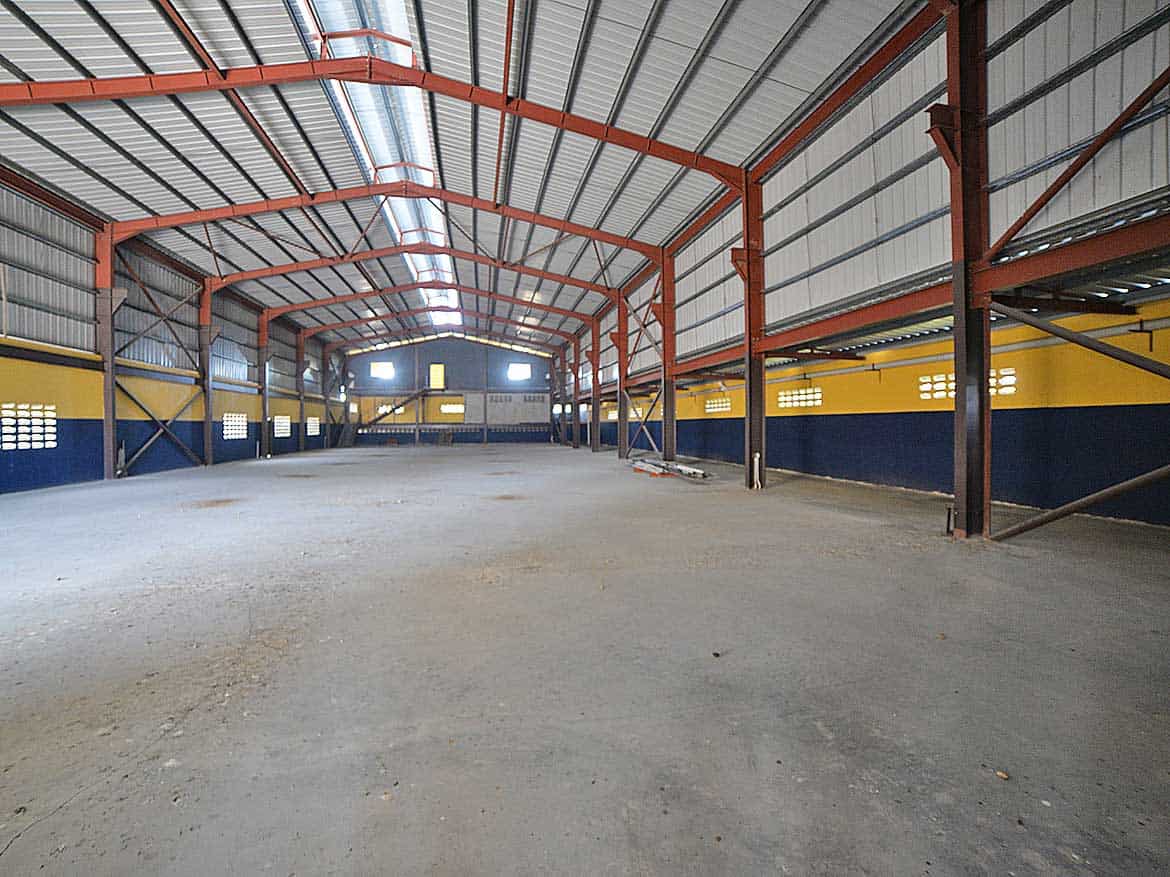 e TecK Building Interior at Cornerstone Cornerstone- Spacious industrial warehouse interior at Cornerstone with steel framework.