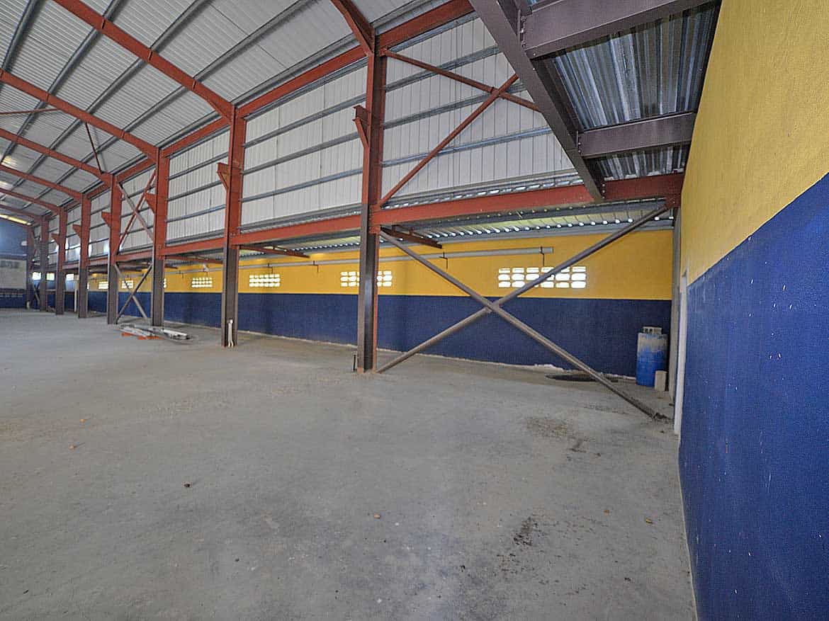 e TecK Building Interior at O’meara Cornerstone- Interior view of the e TecK building at O'meara with colorful walls and steel structure.
