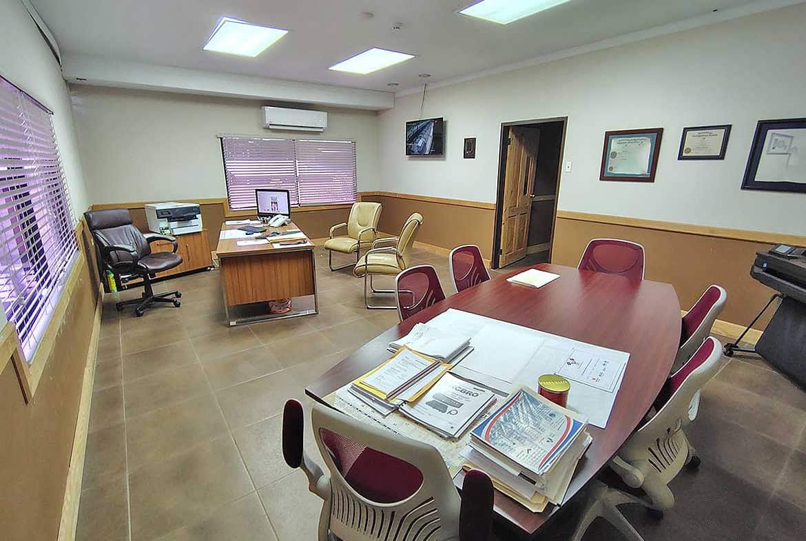 Cornerstone- Interior of a professional office meeting room at e TecK Building, O'meara.
