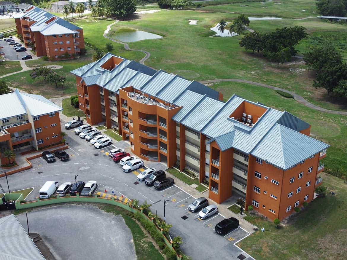 EastGate on the Greens Residential Complex Aerial view of EastGate on the Greens residential apartments and parking lot.