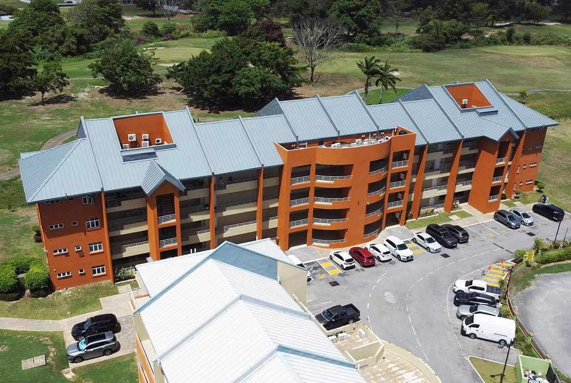 Aerial view of EastGate on the Greens residential complex with parking lot.