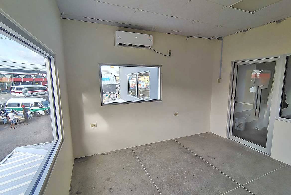Cornerstone- Empty commercial space with air conditioning in Curepe.