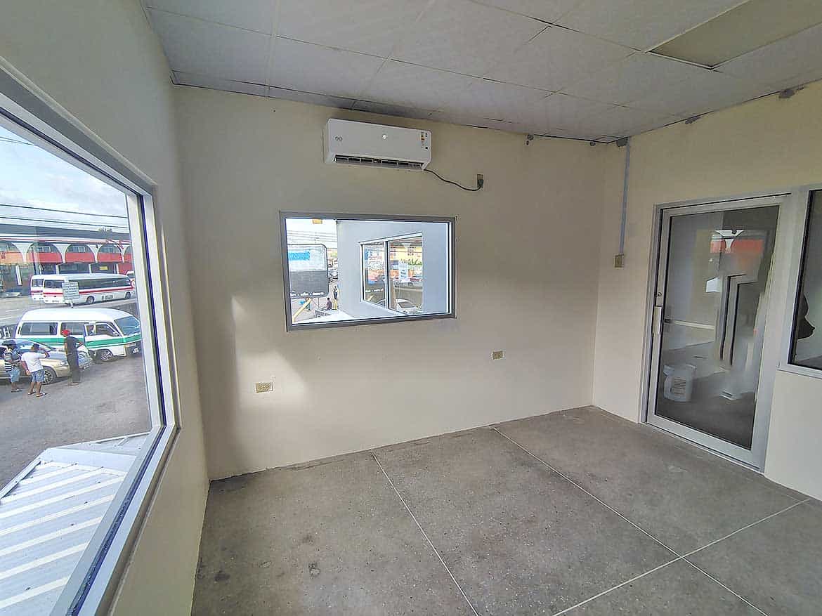 Commercial Space Interior Curepe Cornerstone- Empty commercial space with air conditioning in Curepe.