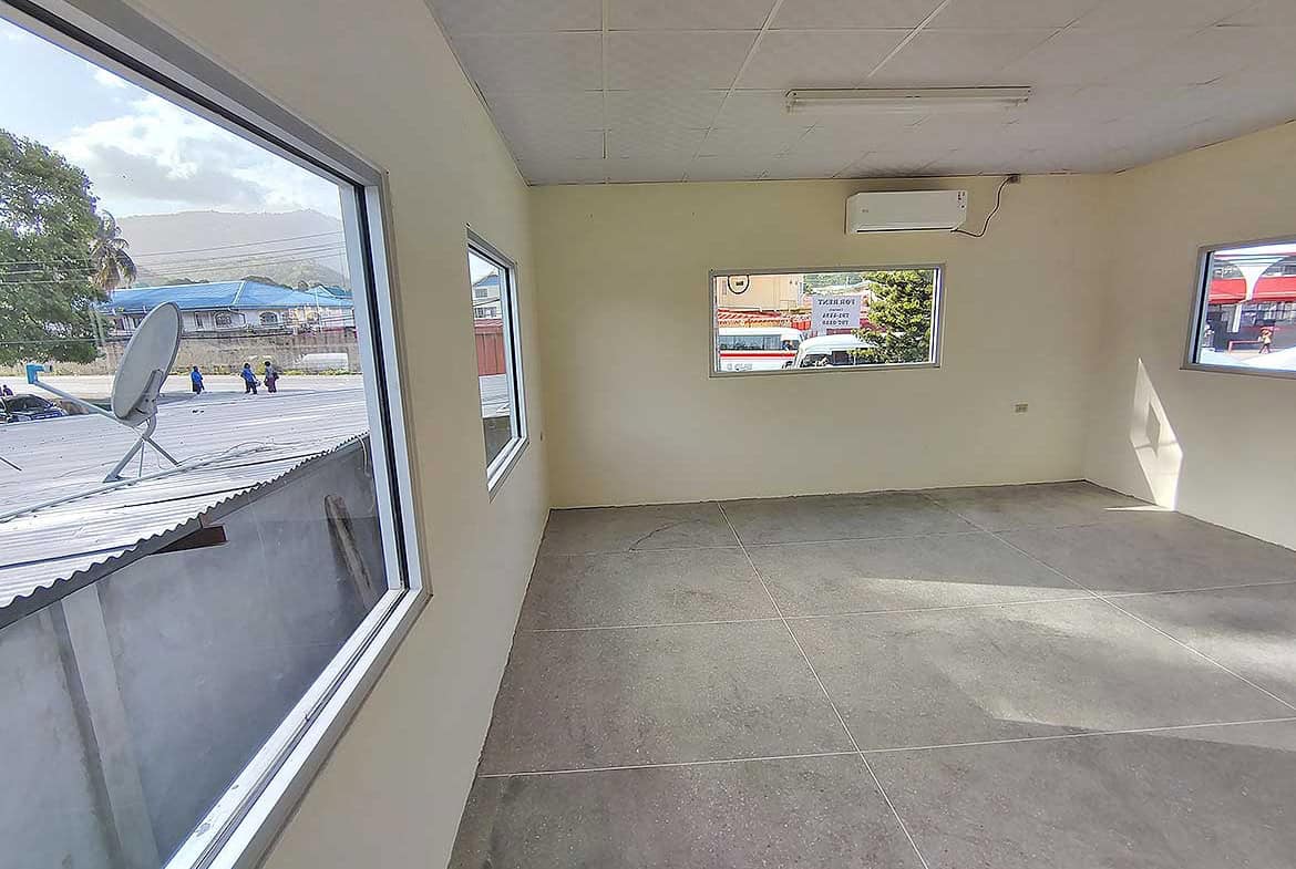 Cornerstone- Spacious commercial room with large windows and air conditioning in Curepe.