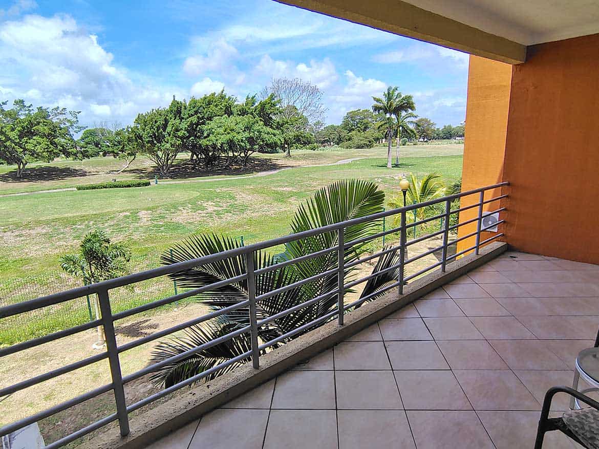 Cornerstone™ EastGate on the Greens Balcony View Balcony view overlooking lush green landscape at Cornerstone™ EastGate on the Greens.