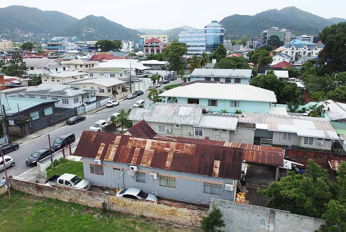 Cornerstone- Aerial view of Carlos Street in Woodbrook with mixed residential and commercial buildings.