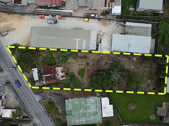 Cornerstone- Aerial view of Cornerstone™ property on St Lucien Road with surrounding buildings and greenery.
