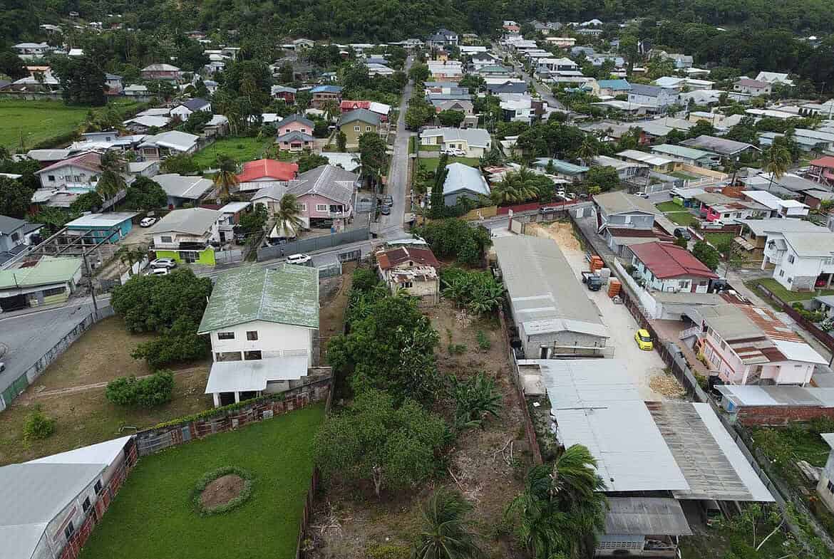 Cornerstone- Aerial view of houses and greenery along St Lucien Road.
