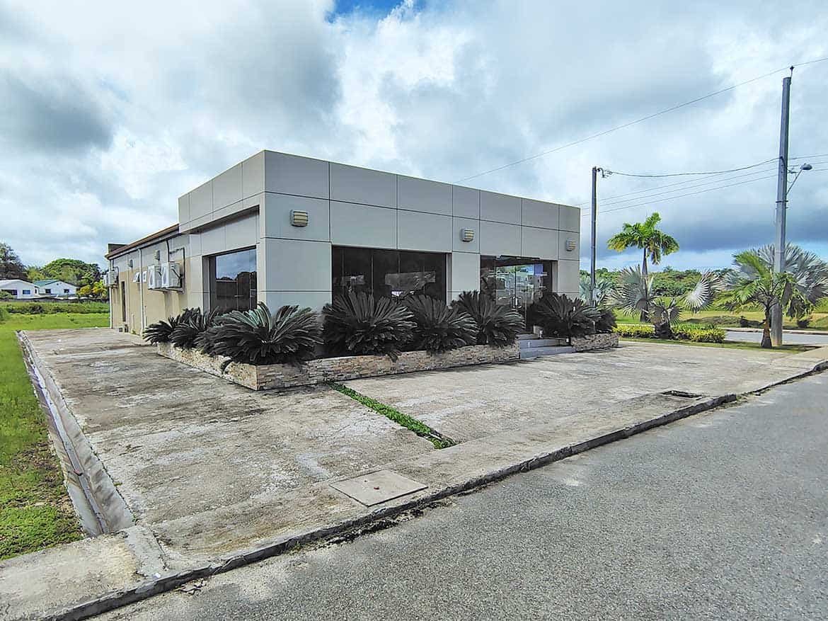 Cornerstone™ Commercial Building in Ella Vista Modern commercial building with landscaping in Ella Vista Gardens, Trinidad.