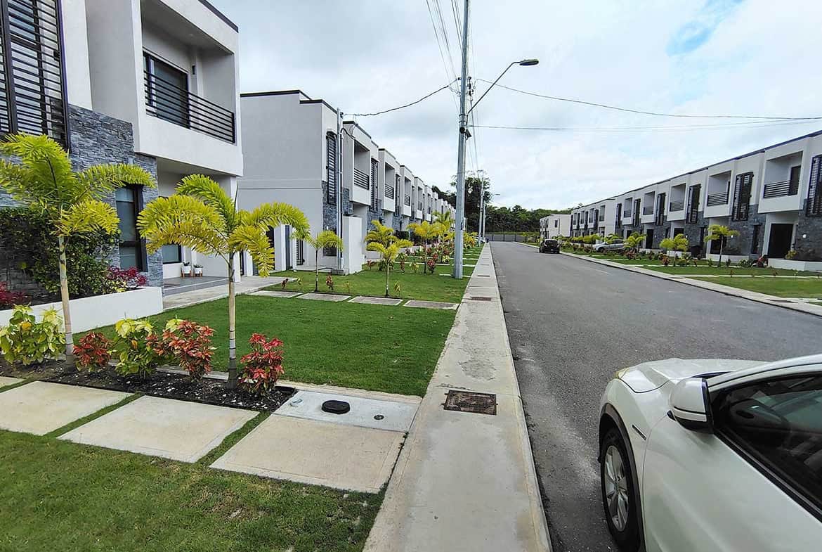 Modern residential townhouses with landscaped gardens in Ella Vista Gardens, 8B.