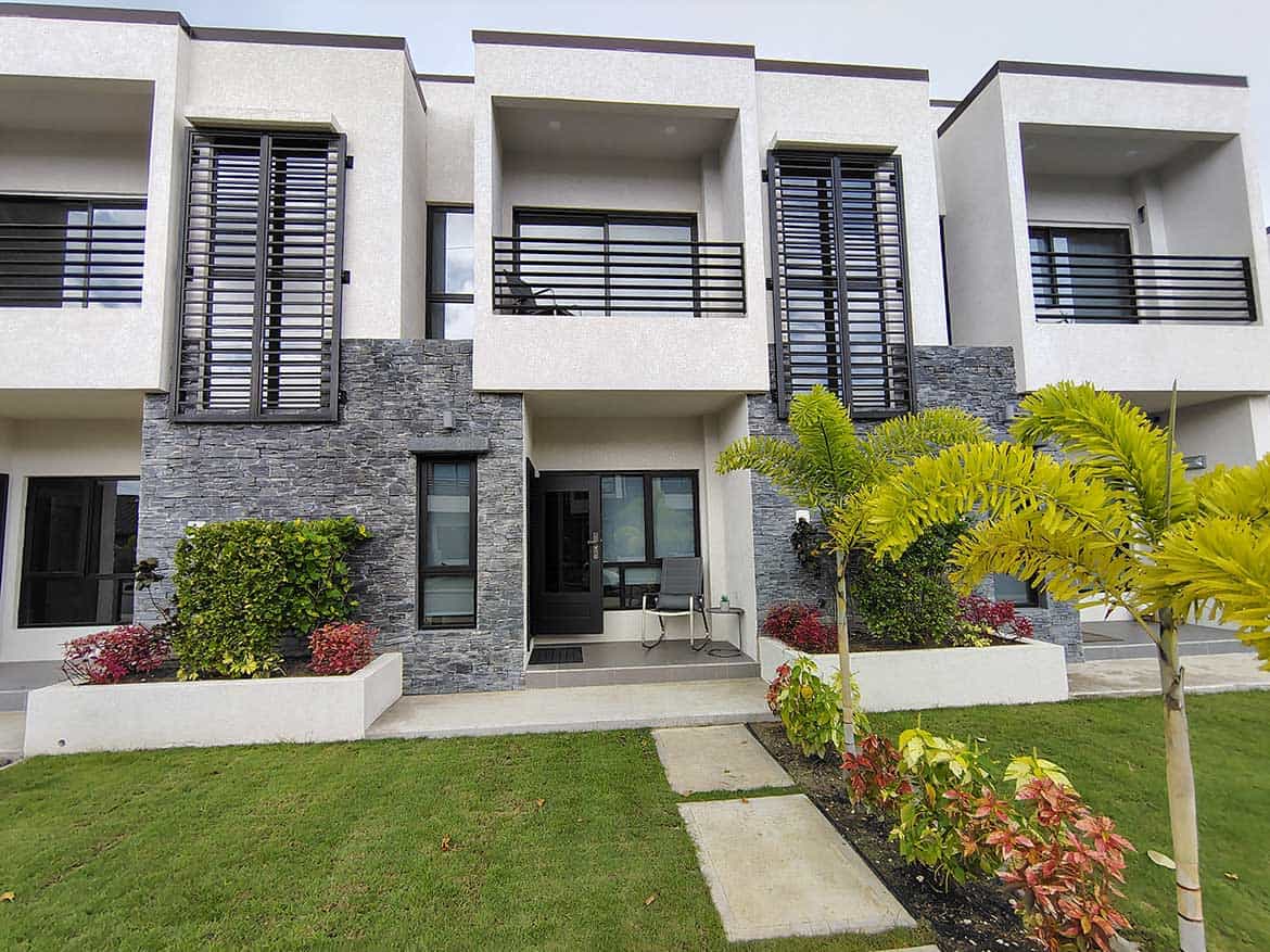 Contemporary Townhouse at Ella Vista Gardens Modern townhouse with landscaped garden and balcony at Ella Vista Gardens.