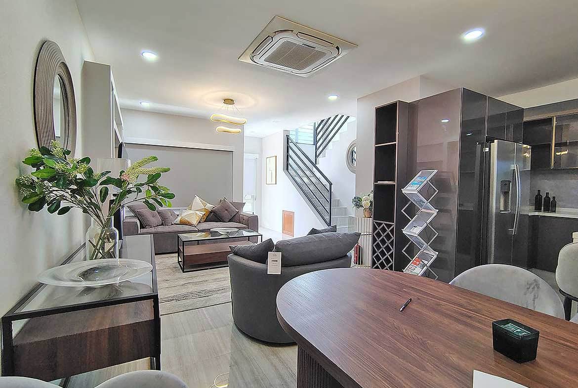 Modern living room with stylish furniture and decor at Ella Vista Gardens.