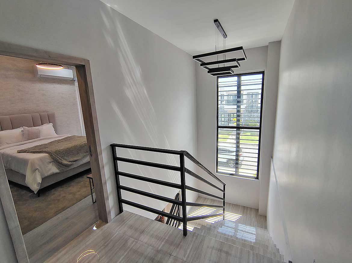 Modern Interior of Ella Vista Gardens Bright staircase area in Ella Vista Gardens residential complex.