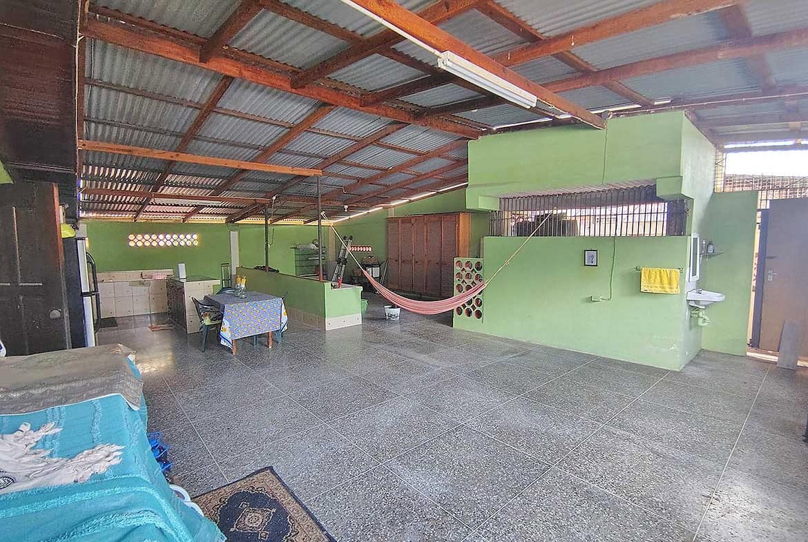 Interior view of Cornerstone™ manufacturing plant with green walls and machinery.
