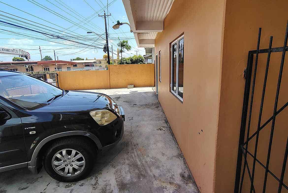 Cornerstone- Parking area outside Cornerstone™ EMR Tacarigua Apt 4 building.